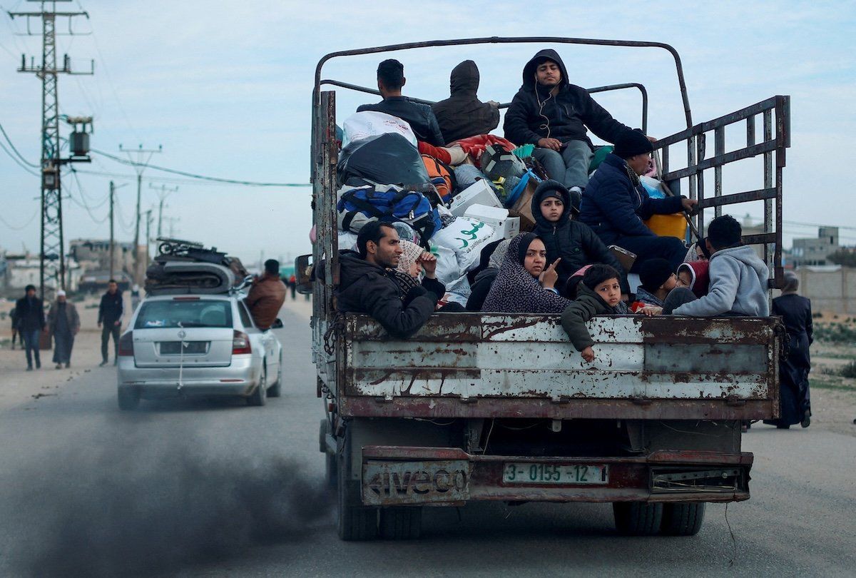 ​Palestinians leave Rafah in fear of an Israeli military operation in the southern Gaza Strip, on Feb. 13, 2024. 