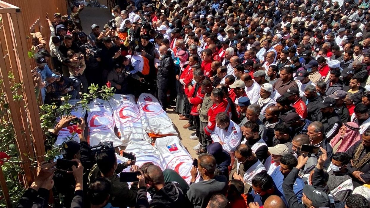 Palestinians mourn medics, who came under Israeli fire while on a rescue mission, after their bodies were recovered, according to the Red Crescent, at Nasser hospital in Khan Younis in the southern Gaza Strip March 31, 2025.