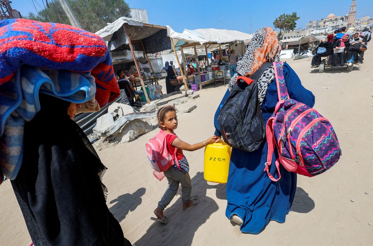 Palestinians, who fled the eastern part of Khan Younis after they were ordered by Israeli army to evacuate their neighborhoods, make their way, amid Israel-Hamas conflict, in Khan Younis in the southern Gaza Strip July 2, 2024.