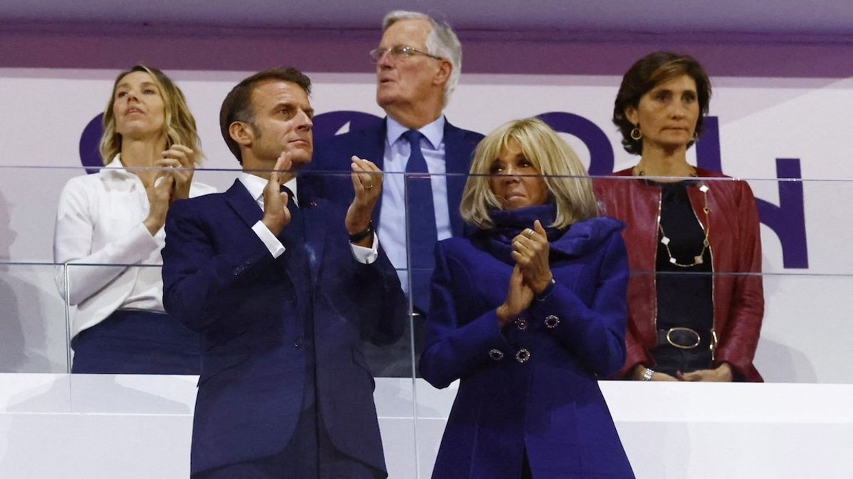 Paris 2024 Paralympics - Closing Ceremony - Paris, France - September 8, 2024 France's Prime minister Michel Barnier, French President Emmanuel Macron and wife Brigitte Macron are seen ahead of the closing ceremony