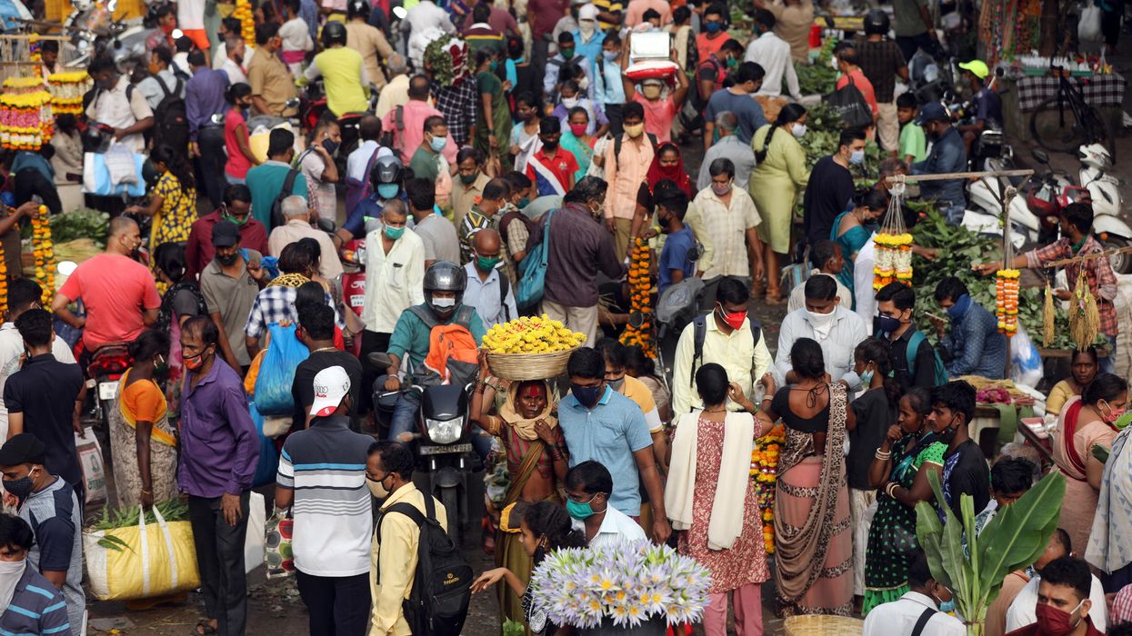 People are seen at a crowded market a day before the Hindu festival of Dussehra amidst the spread of the coronavirus disease (COVID-19) in Mumbai, India, October 24, 2020
