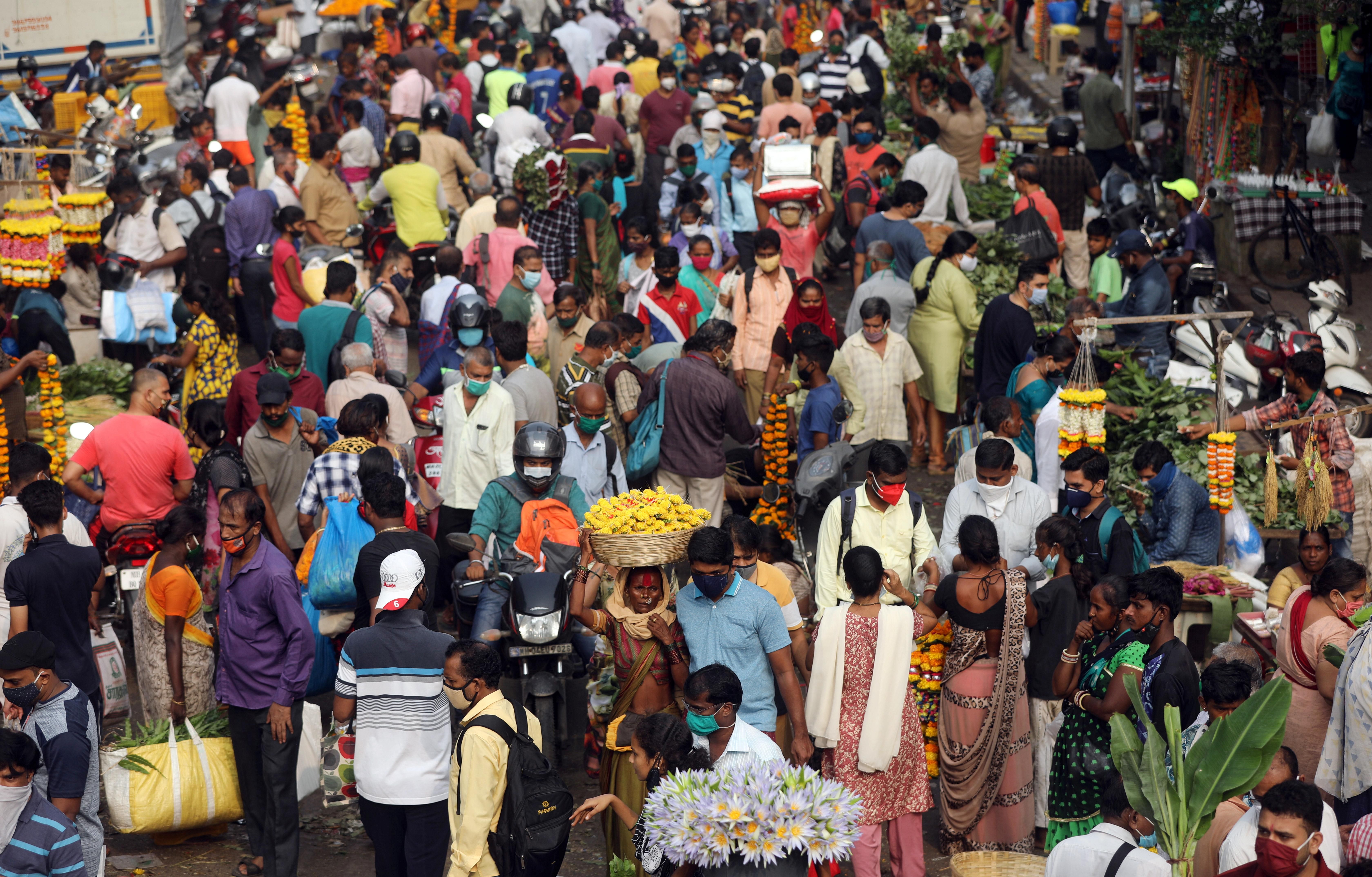 People are seen at a crowded market a day before the Hindu festival of Dussehra amidst the spread of the coronavirus disease (COVID-19) in Mumbai, India, October 24, 2020