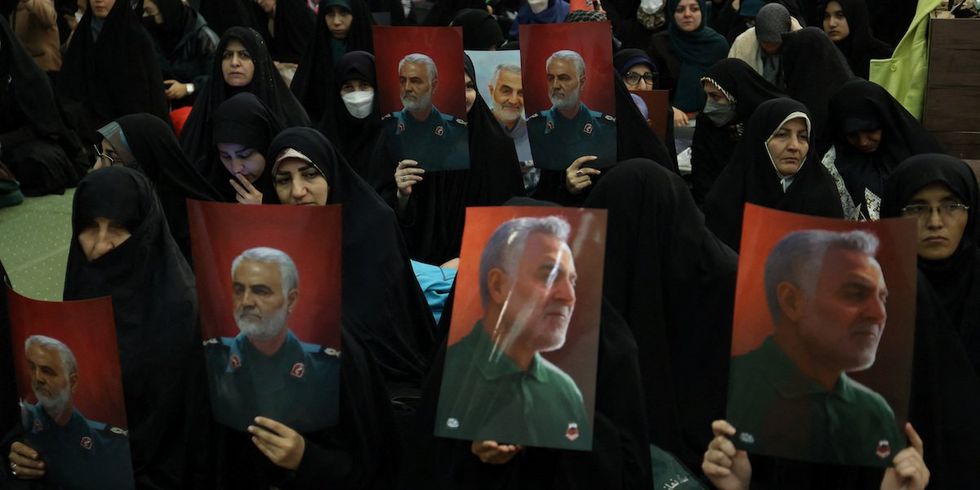 People attend a ceremony commemorating the death of late Iranian General Qassem Soleimani, in Tehran, Iran, January 3, 2024. 