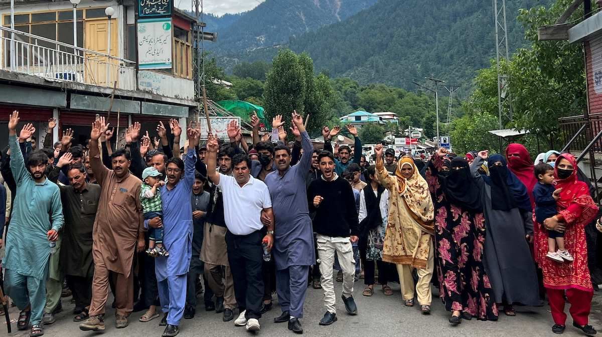 People chant slogans as they walk during a protest and shutter-down strike called by the banned Joint Awami Action Committee (JAAC), an alliance of civil society groups, in Neelum Valley, Pakistani Kashmir.