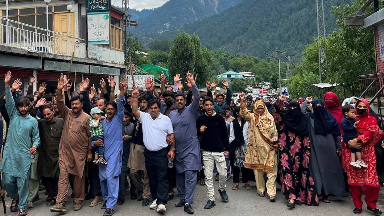 People chant slogans as they walk during a protest and shutter-down strike called by the banned Joint Awami Action Committee (JAAC), an alliance of civil society groups, in Neelum Valley, Pakistani Kashmir.