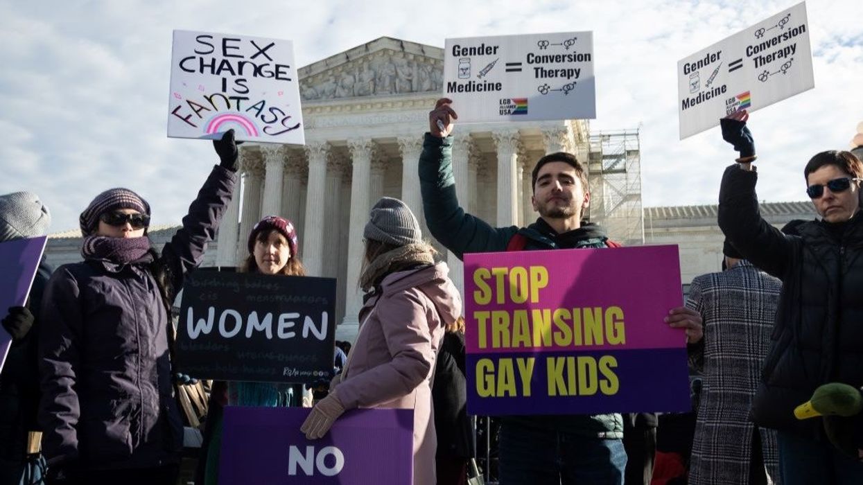 People demonstrations outside the Supreme Court against gender-affirming care for transgender children in Washington, DC, on December 4, 2024. The Court is hearing oral arguments in the United States vs. Skirmetti, which challenges Tennessee’s ban on transgender care for minors. The ruling could affect the 26 states that criminalize gender-affirming care for children.