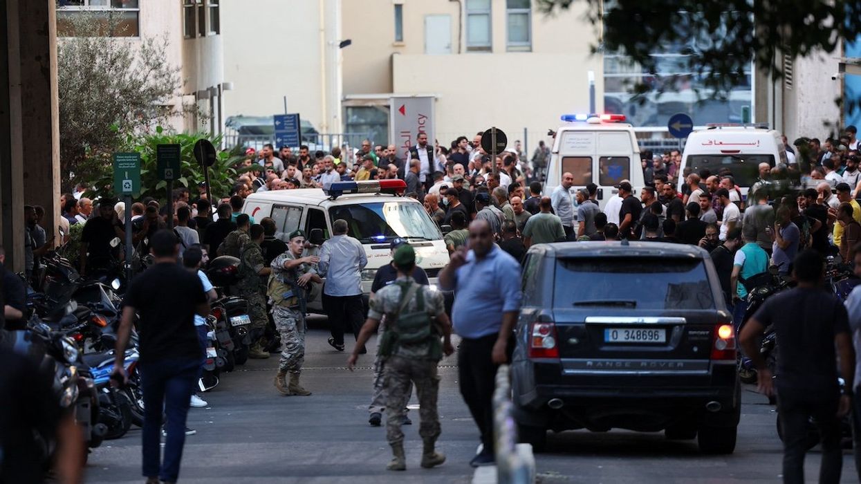 People gather outside a hospital as more than 1,000 people, including Hezbollah fighters and medics, were wounded when the pagers they use to communicate exploded across Lebanon, according to a security source, in Beirut, Lebanon September 17, 2024.