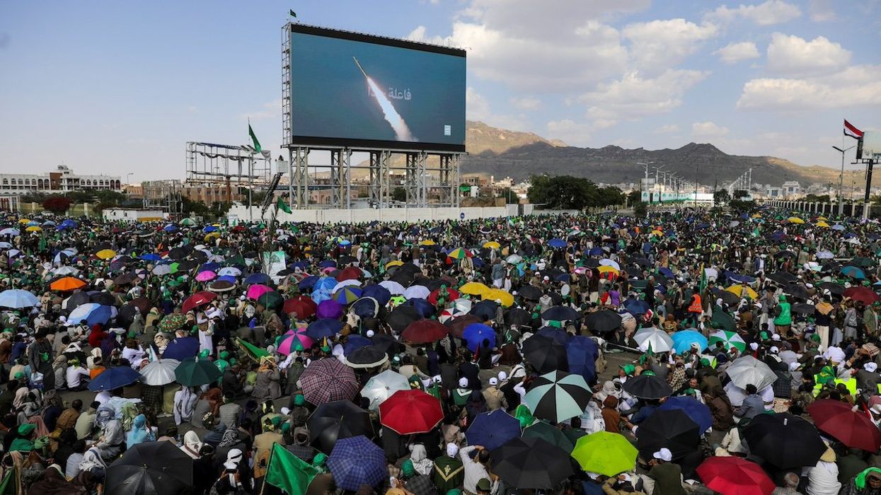 People, mainly Houthi supporters, rally to mark the anniversary of the birth of the Prophet Mohammad and to show solidarity with Palestinians in the Gaza Strip, in Sanaa, Yemen, September 15, 2024.