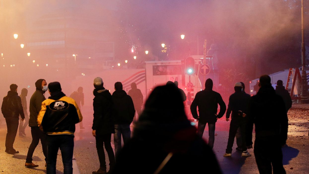 People protest against coronavirus disease (COVID-19) measures near the European Commission in Brussels, Belgium November 21, 2021.