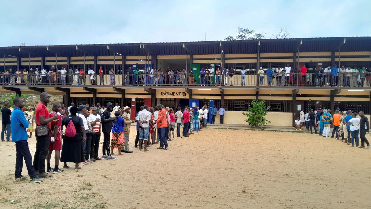 ​People wait in line for the opening of a polling office during the presidential election in Libreville, Gabon, on Aug. 26, 2023.
