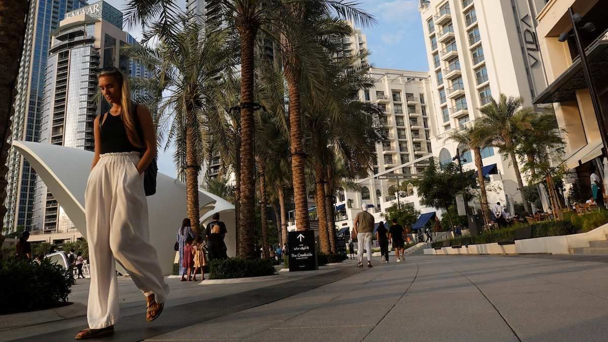 People walking along the Dubai Creek Harbour