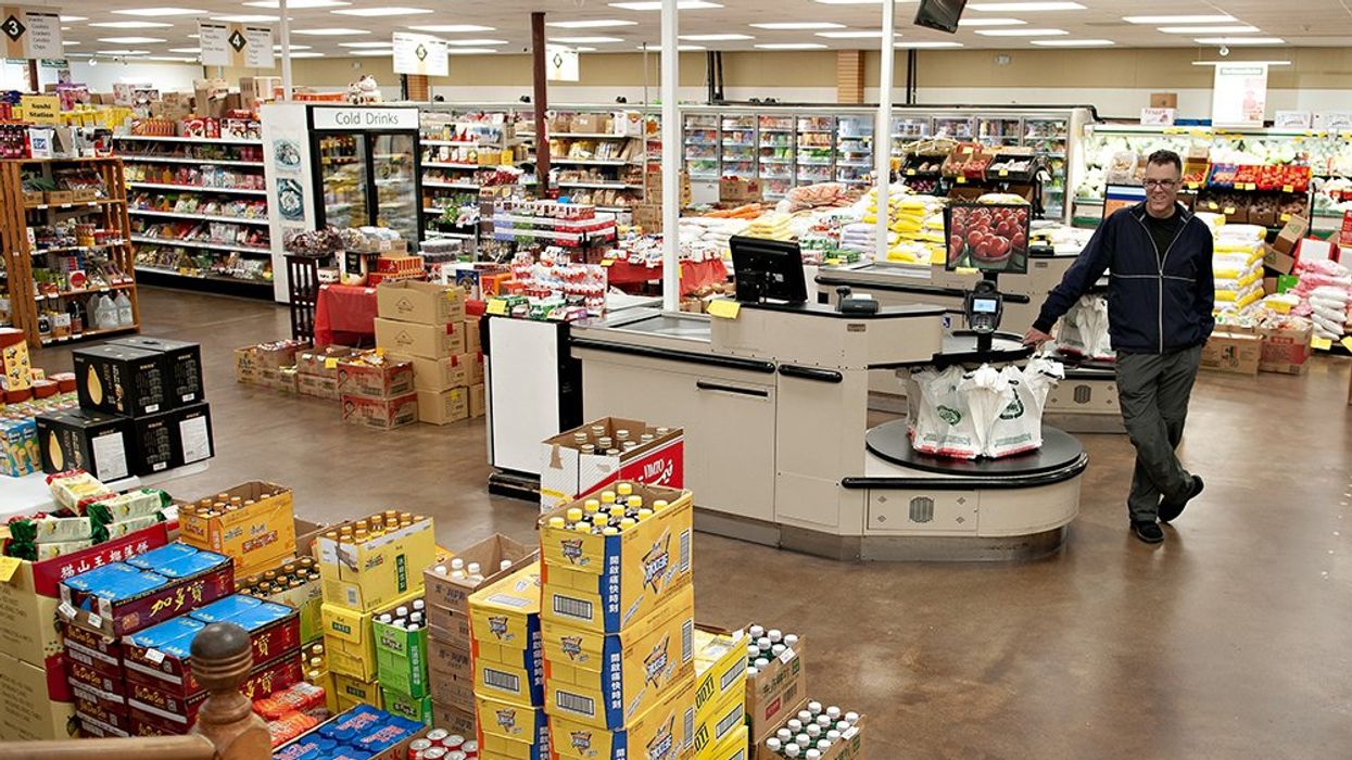 Person standing in a grocery store