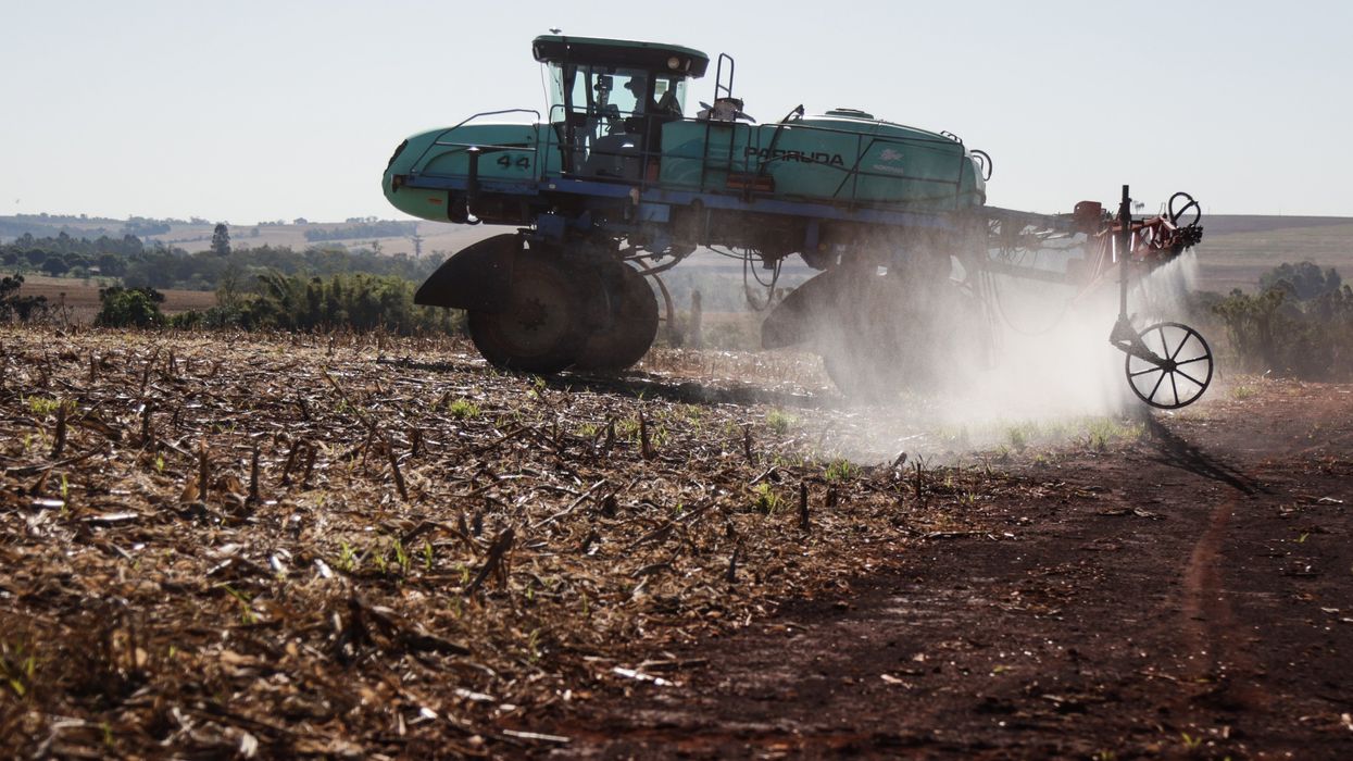 Pesticides being sprayed on a field