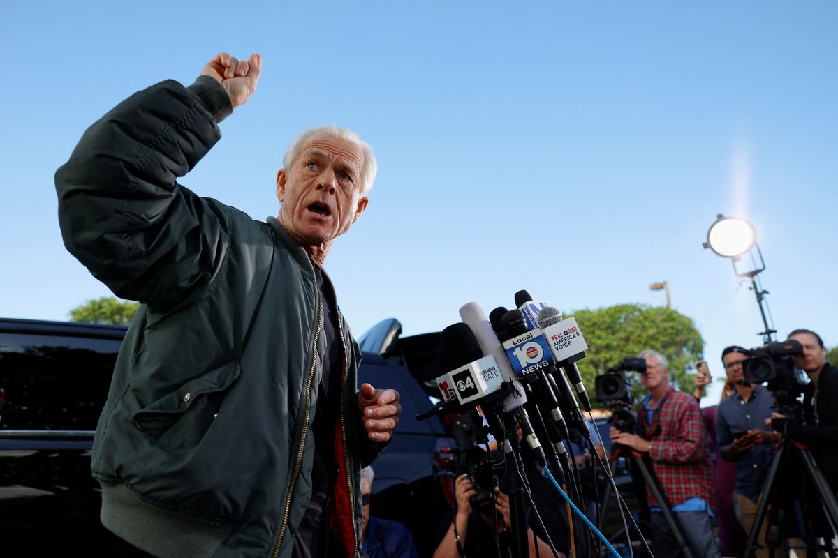 Peter Navarro, who served as U.S. then-President Donald Trump's trade adviser, talks to the media before turning himself in at a federal correctional institution to begin his prison sentence for defying a subpoena from a panel that investigated the January 6, 2021, attack on the U.S. Capitol, in Miami, Florida, U.S.