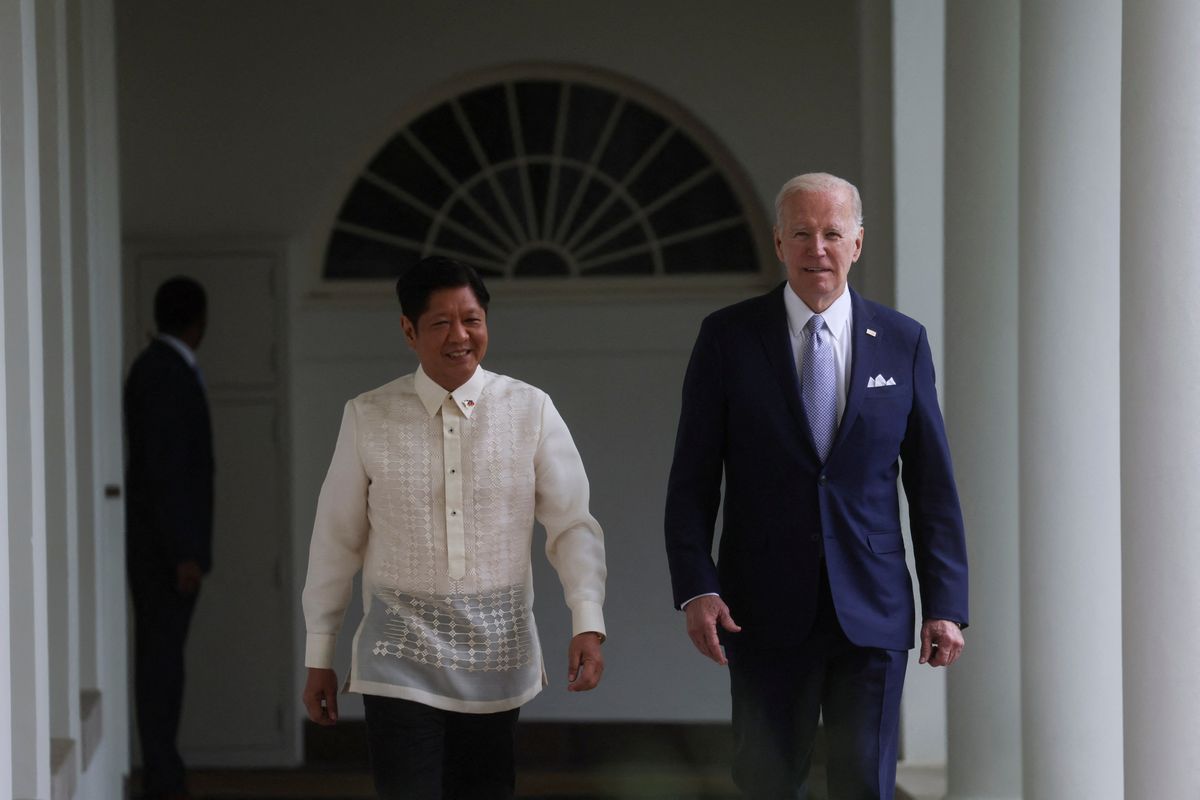 Philippine President Ferdinand Marcos Jr. and US. President Joe Biden walk to the Oval Office at the White House in Washington, DC.