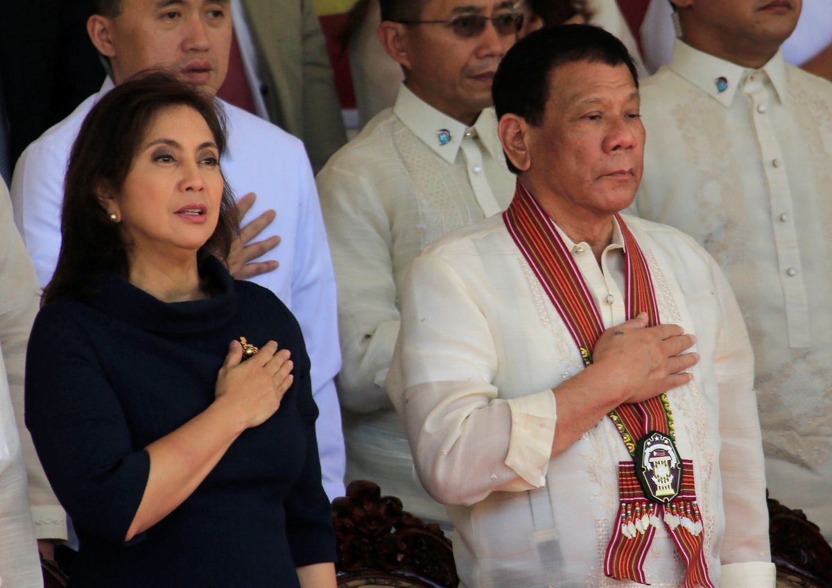 Philippine President Rodrigo Duterte (R) and Vice President Leni Robredo (L). Reuters