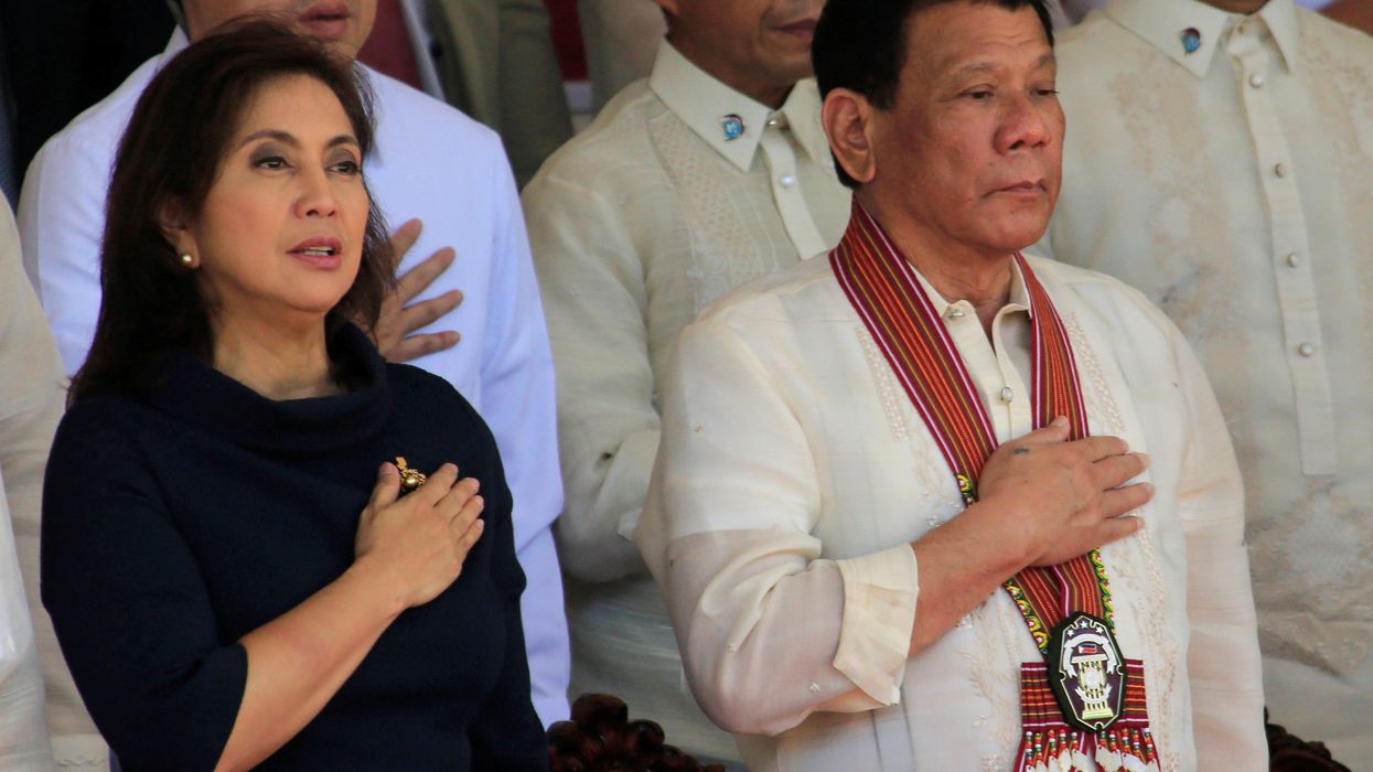 Philippine President Rodrigo Duterte (R) and Vice President Leni Robredo (L). Reuters