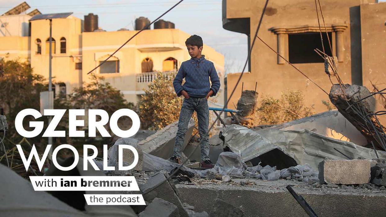 Photo of a young Palestinian boy in Gaza with the GZERO World Podcast logo superimposed on top.