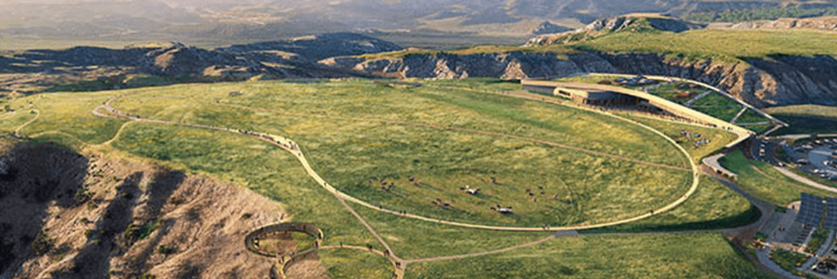 Photograph of a scenic landscape with mountains in the background