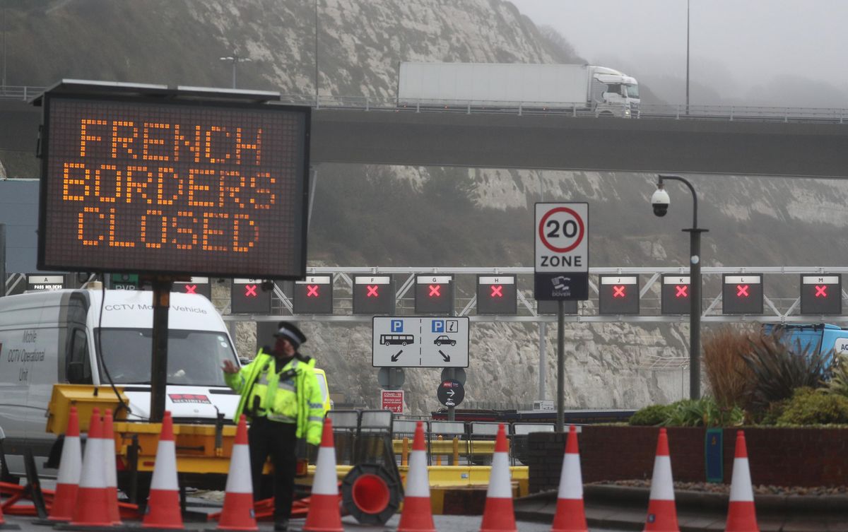 Police and port staff at the Port of Dover in Kent which has been closed after the French government's announcement it will not accept any passengers arriving from the UK for the next 48 hours amid fears over the new mutant coronavirus strain
