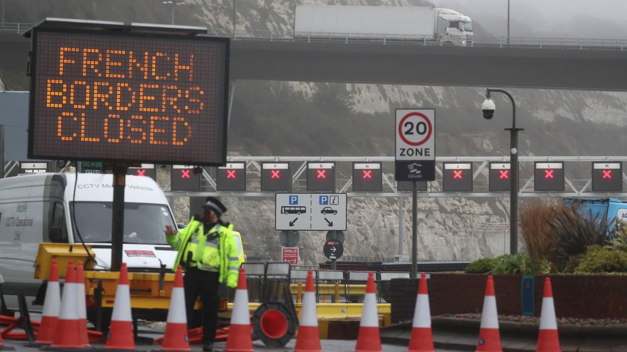 Police and port staff at the Port of Dover in Kent which has been closed after the French government's announcement it will not accept any passengers arriving from the UK for the next 48 hours amid fears over the new mutant coronavirus strain