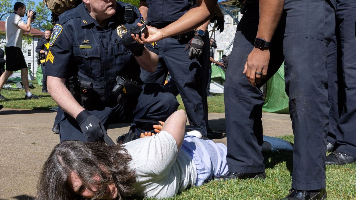 Police arrest Emory economics professor Caroline Fohlin during a rally in which Pro-Palestinian protestors set up an encampment at the Emory Campus in Atlanta, on Thursday, April 25, 2024.