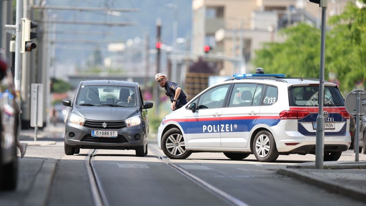 Police in and around a high school in Graz, Austria, after a gunman killed nine people at the school, on June 10, 2025.