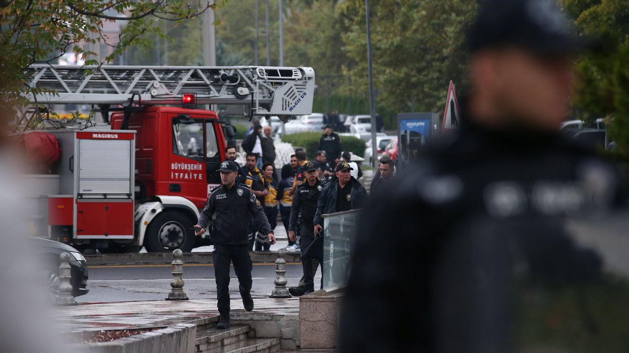 Police officers secure an area near the Interior Ministry following a bomb attack in Ankara, Turkey, on Oct. 1, 2023.