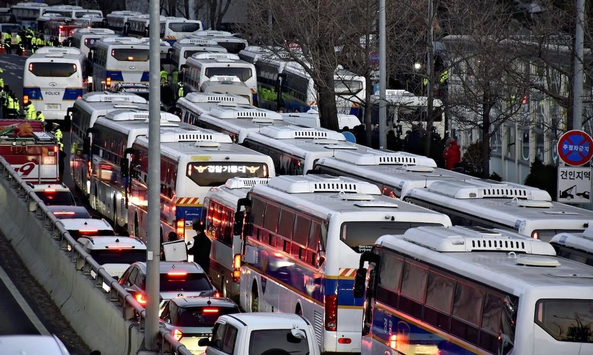 Police vans are lined up in front of South Korean President Yoon Suk Yeol's official residence in Seoul on Jan. 3, 2025.