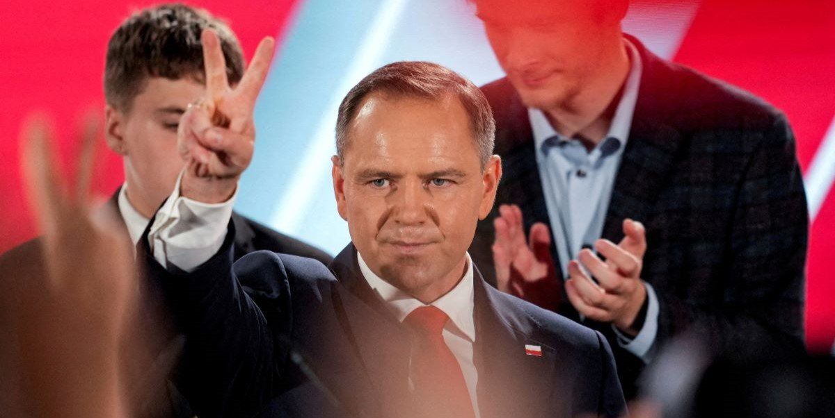​Polish presidential candidate Karol Nawrocki, backed by the main opposition Law and Justice (PiS) party, reacts to the exit polls of the second round of the presidential election, in Warsaw, Poland, June 1, 2025. 
