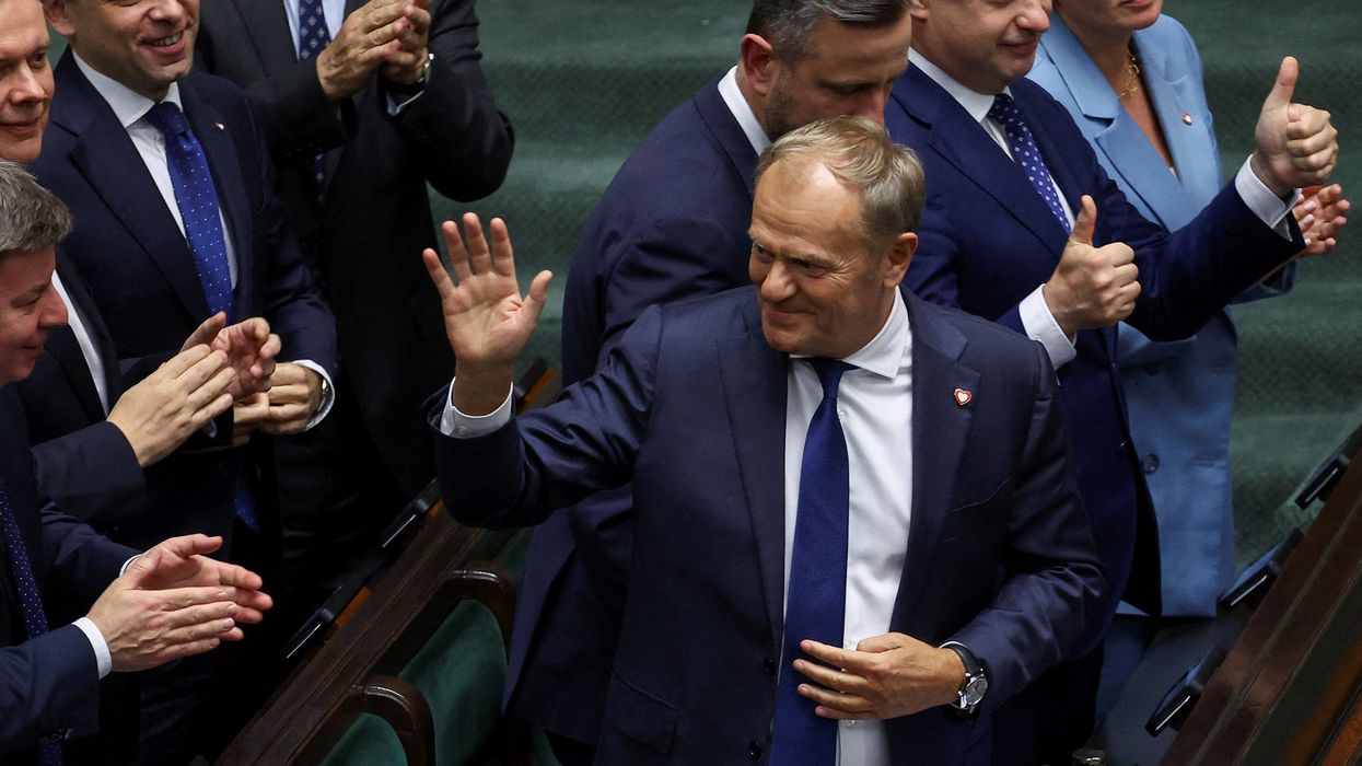Polish Prime Minister Donald Tusk reacts after a vote of confidence for his center-left coalition government.