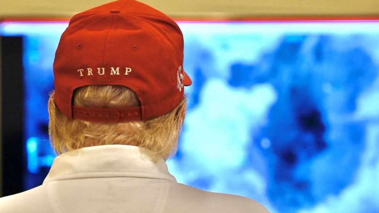 President Donald Trump looks on as military strikes are launched against Yemen's Iran-aligned Houthis over the group's attacks against Red Sea shipping.