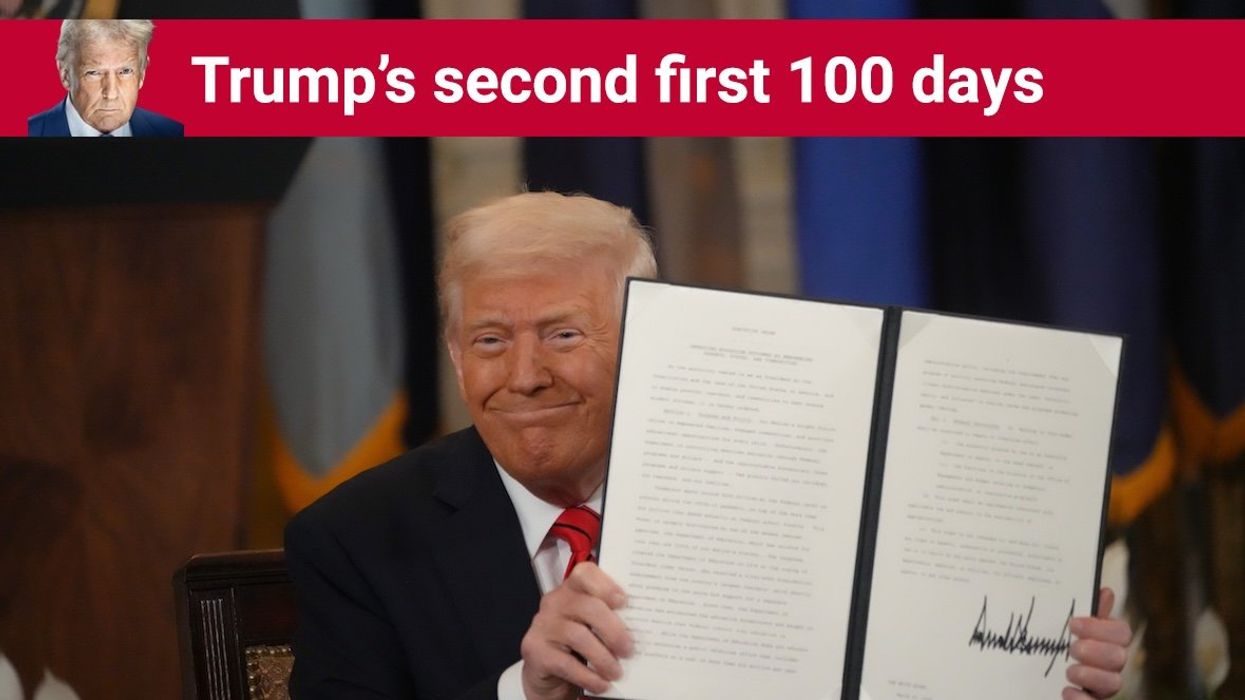 President Donald Trump signs an executive order to start the elimination of the Department of Education on March 20, 2025.