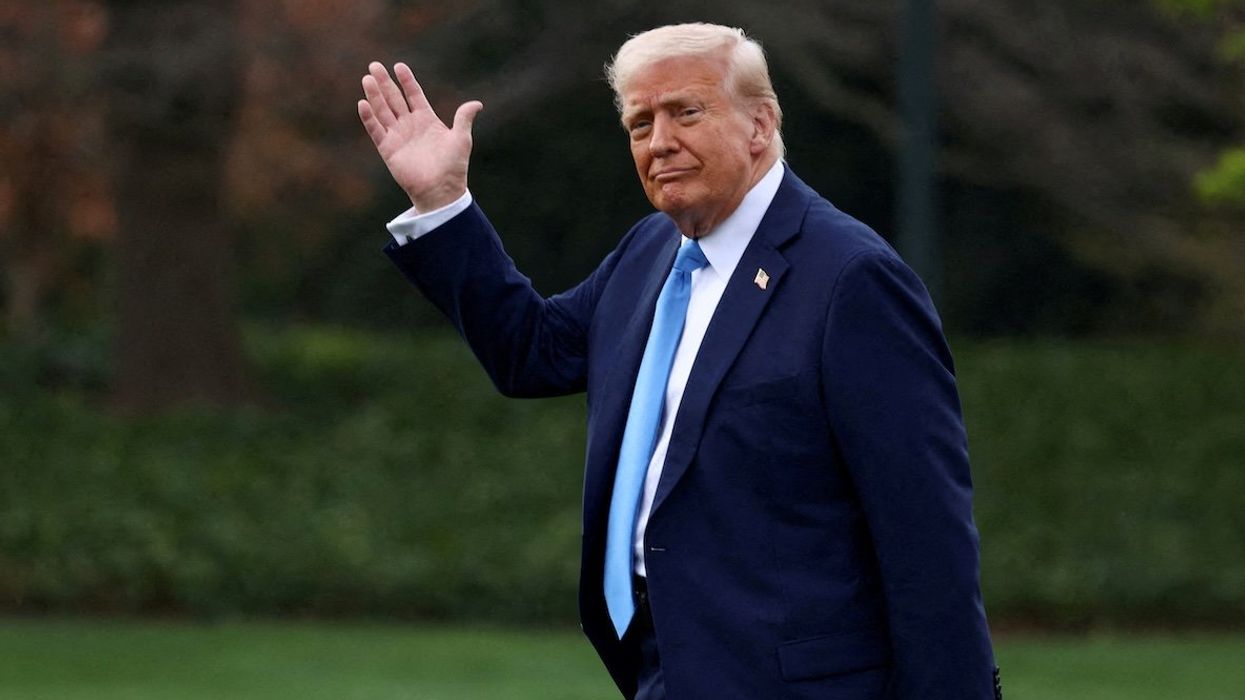 President Donald Trump waves as he walks before departing for Florida from the South Lawn at the White House in Washington, D.C., U.S., on March 28, 2025.