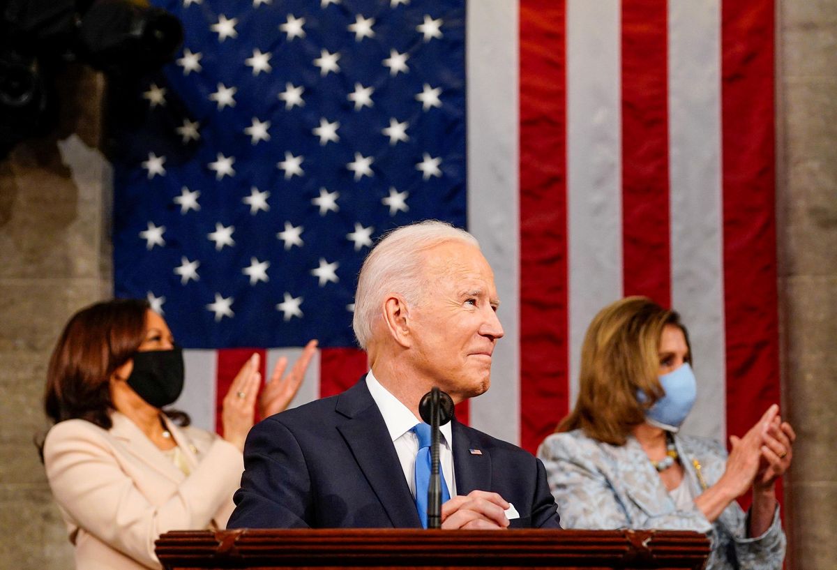 President Joe Biden addresses a joint session of Congress, with Vice President Kamala Harris and House Speaker Nancy Pelosi (D-Calif.) on the dais behind him, in Washington, U.S., April 28, 2021.