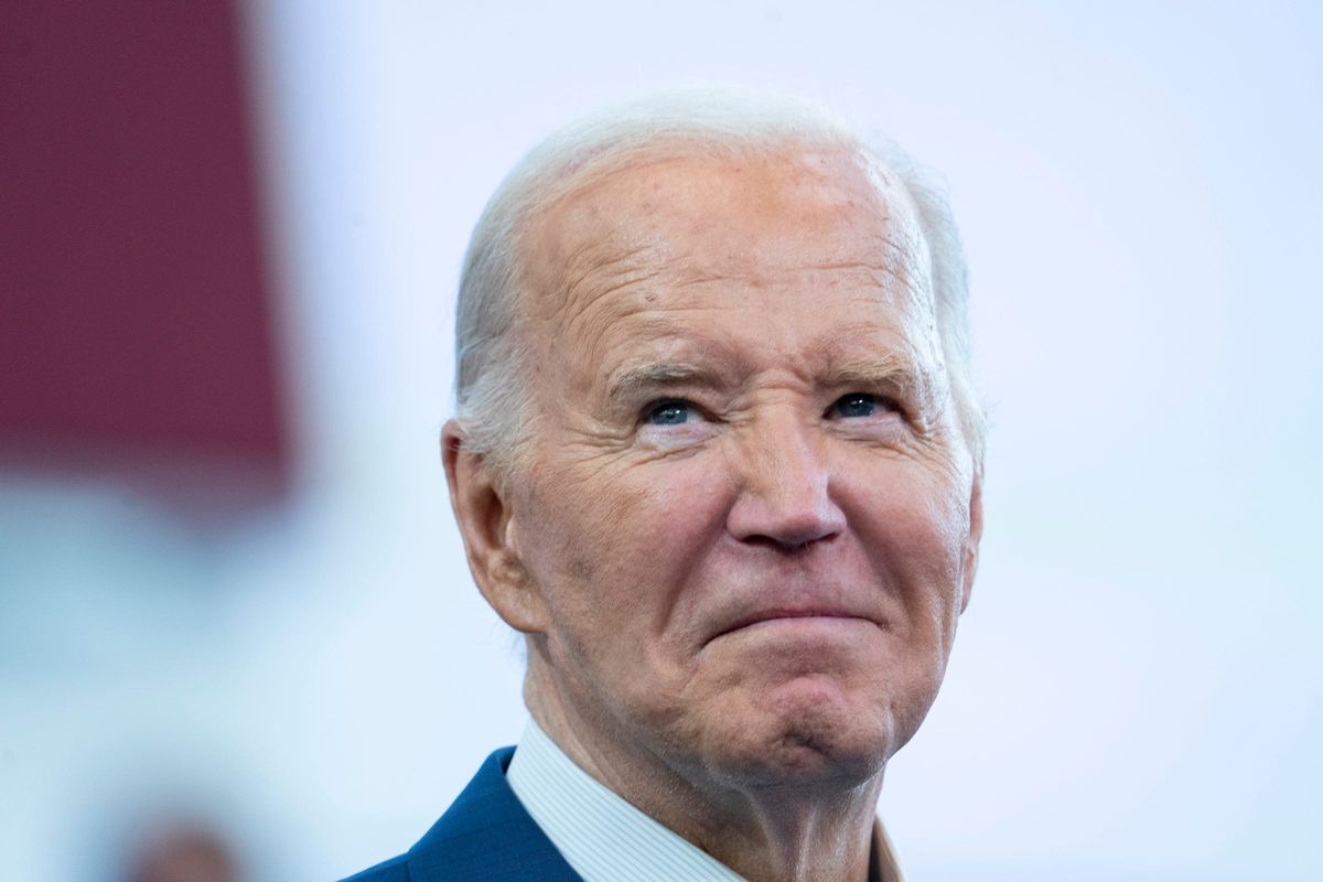 President Joe Biden appears to get emotional when the crowd chants ÒdonÕt give upÓ before he delivers a speech to a large crowd at Renaissance High School in Detroit on Friday, July 12, 2024.