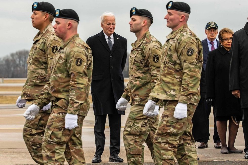 ​President Joe Biden attends the return of the remains of the three slain US soldiers — Sgt. Breonna Alexsondria Moffett, Sgt. William Jerome Rivers, and Sgt. Kennedy Ladon Sanders — at Dover Air Force Base on Friday. 