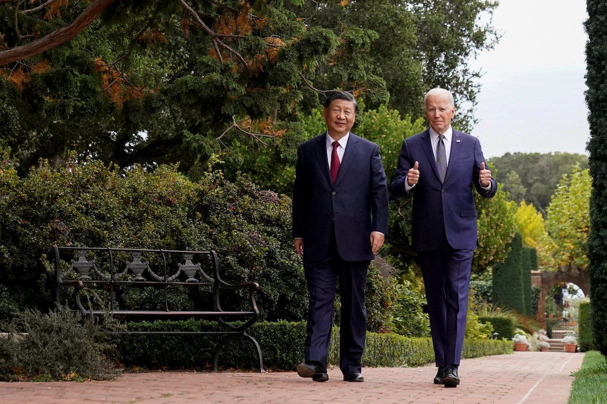 President Joe Biden gives thumbs-up as he walks with Chinese President Xi Jinping on the sidelines of the Asia-Pacific Economic Cooperation in California on Nov. 15, 2023. 