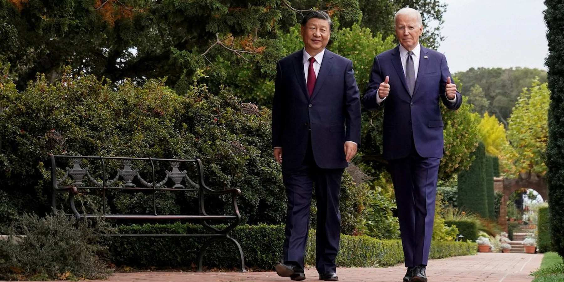 President Joe Biden gives thumbs-up as he walks with Chinese President Xi Jinping on the sidelines of the Asia-Pacific Economic Cooperation in California on Nov. 15, 2023.