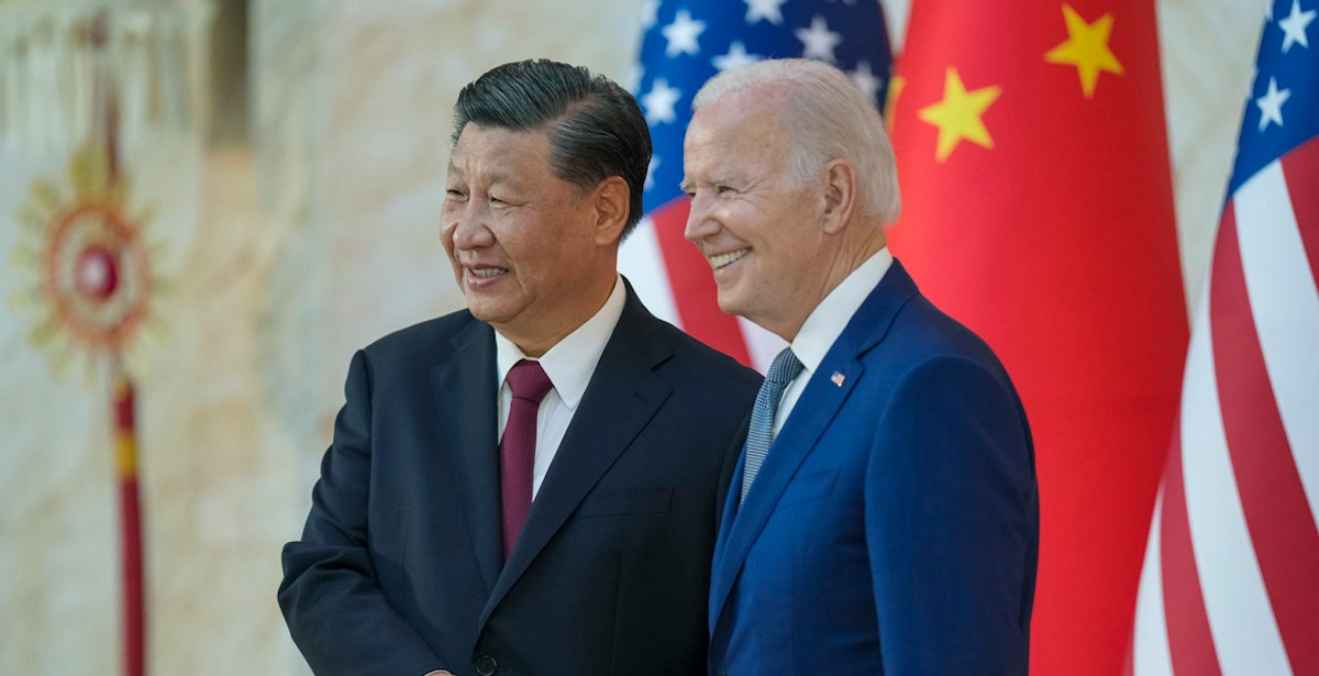 President Joe Biden shakes hands with Chinese President Xi Jinping as they meet on the sidelines of the G20 leaders' summit in Bali, Indonesia, Nov. 14, 2022. ​