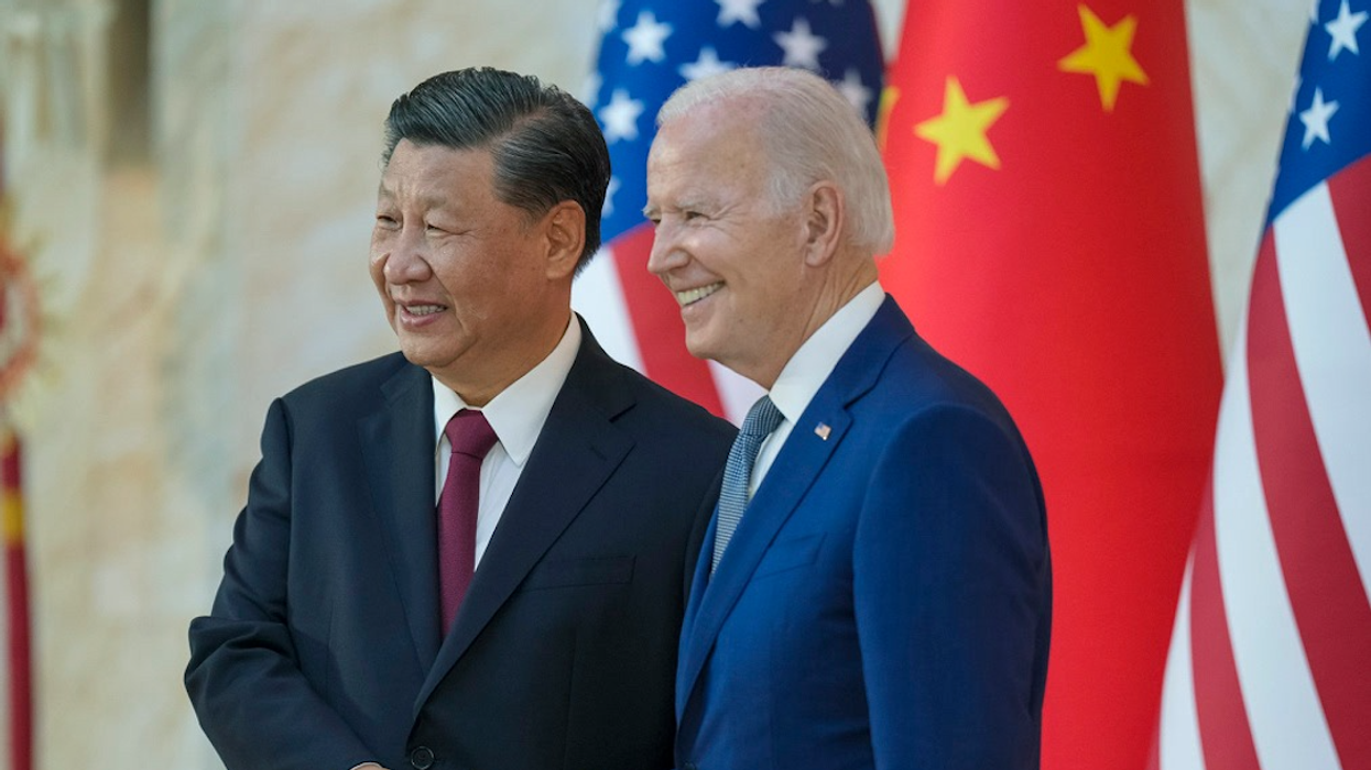 President Joe Biden shakes hands with Chinese President Xi Jinping as they meet on the sidelines of the G20 leaders' summit in Bali, Indonesia, Nov. 14, 2022. 