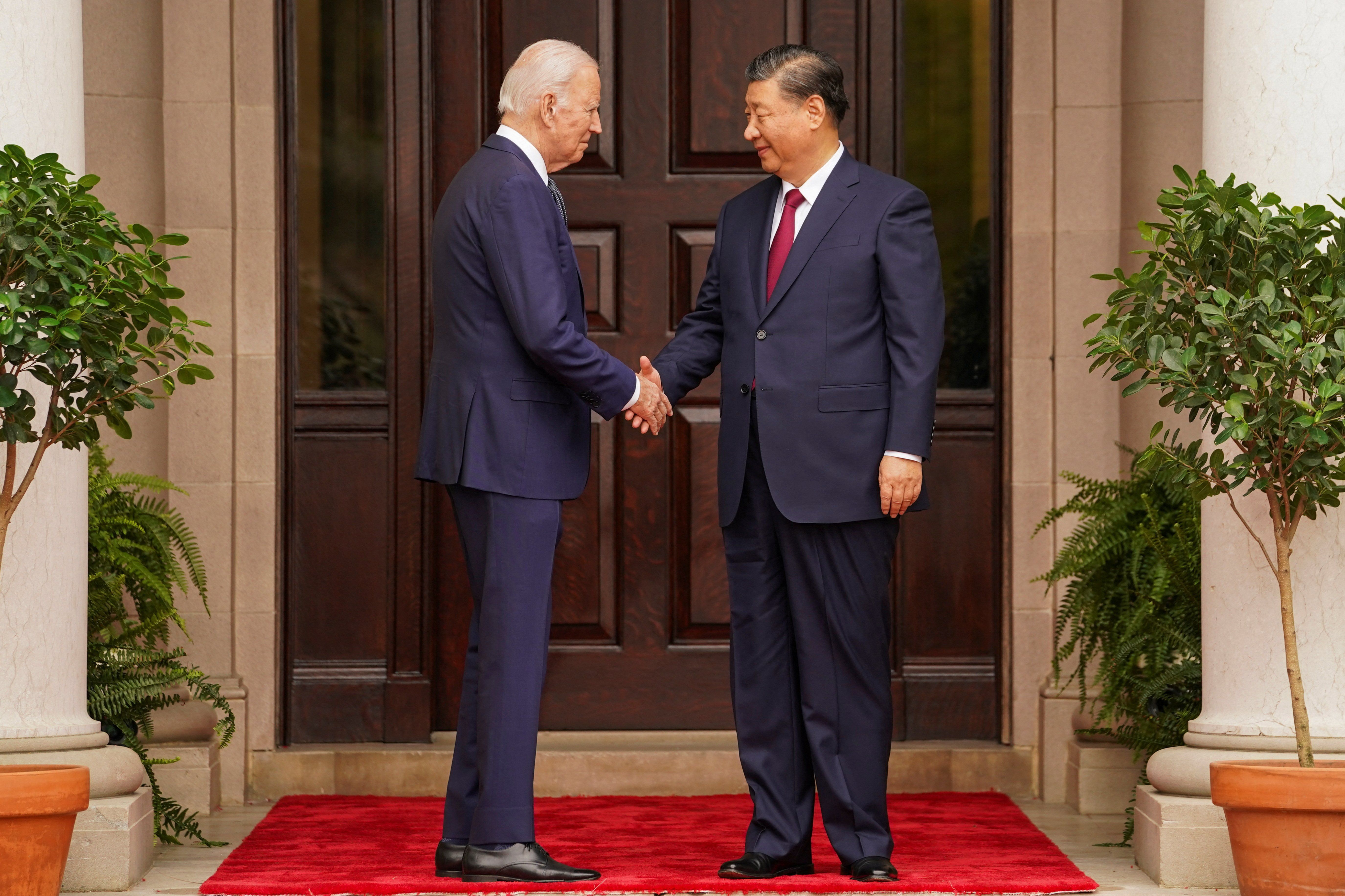 President Joe Biden shakes hands with Chinese President Xi Jinping on the sidelines of the Asia-Pacific Economic Cooperation summit, in California, on Nov. 15, 2023. ​