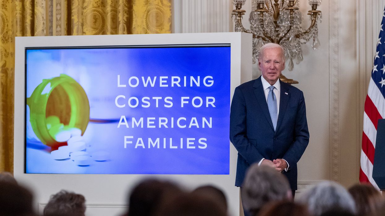 President Joe Biden waits on stage during a White House event announcing moves to lower the prices of ten widely-used prescription drugs