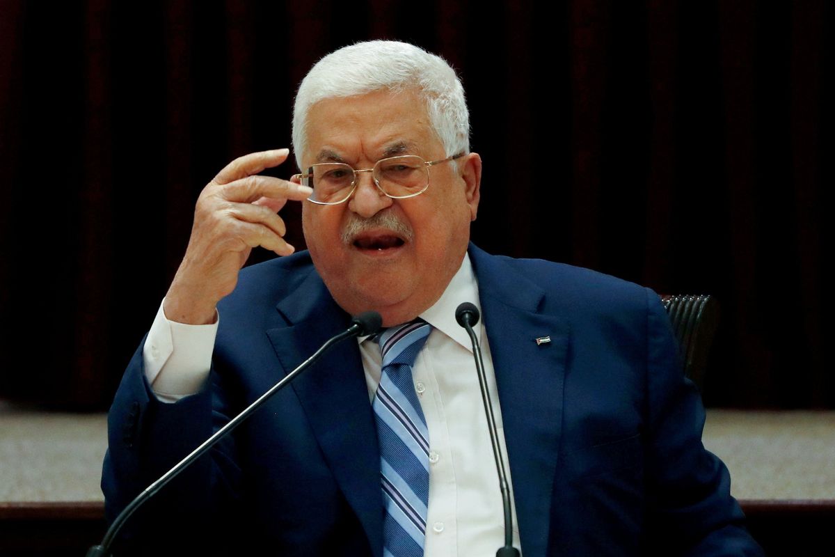 President Mahmoud Abbas gestures during a meeting in Ramallah.
