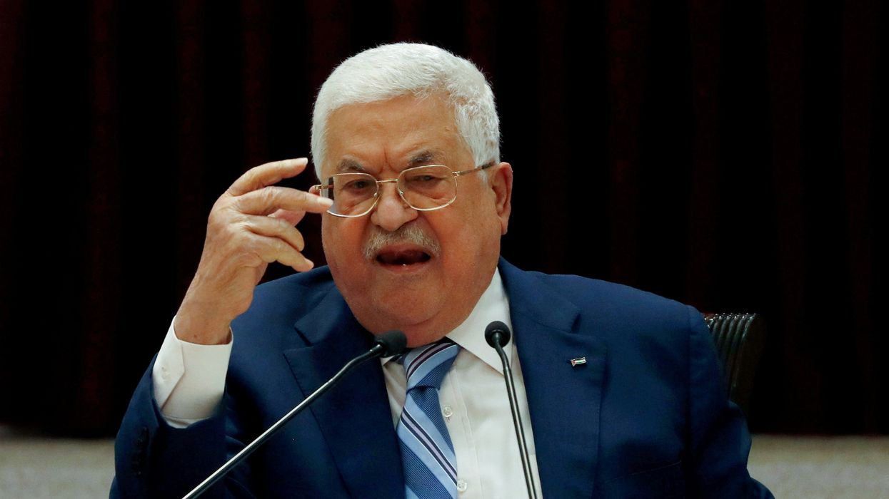 President Mahmoud Abbas gestures during a meeting in Ramallah.