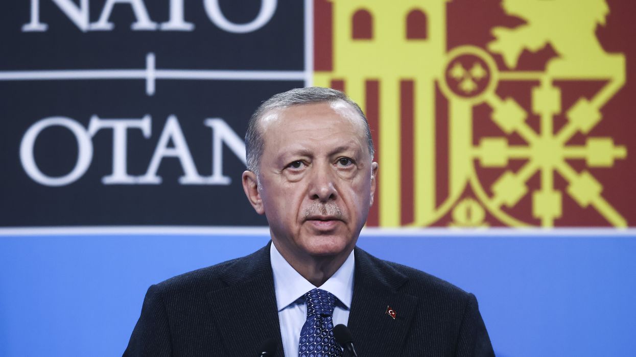 President of Turkey Recep Tayyip Erdogan is holding a press conference during NATO Summit