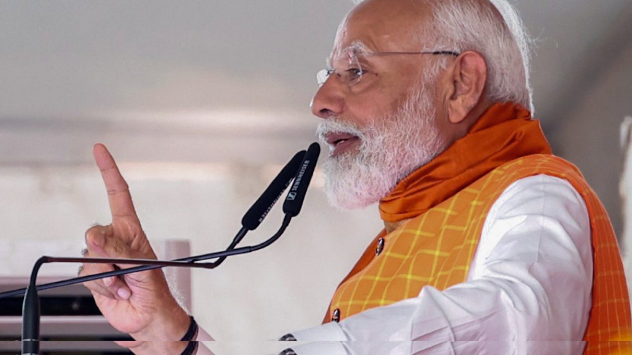 Prime Minister Narendra Modi addresses a public meeting, in Khargone, on Tuesday.