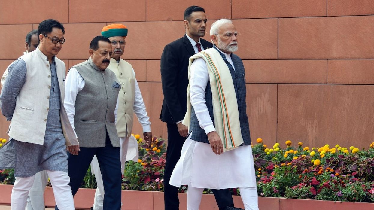 Prime Minister Narendra Modi arrives to address the media ahead of the commencement of the Winter Session of Parliament, in New Delhi, on Monday, Nov. 25.