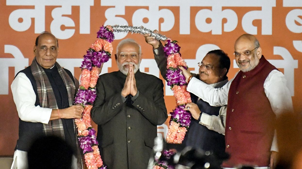 Prime Minister Narendra Modi being garlanded