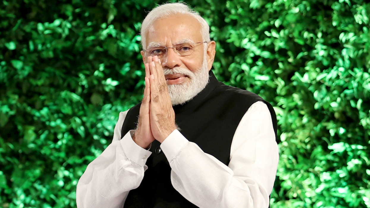 Prime Minister Narendra Modi greets people during the Hindustan Times Leadership Summit, in New Delhi, on Saturday, Nov. 4, 2023.